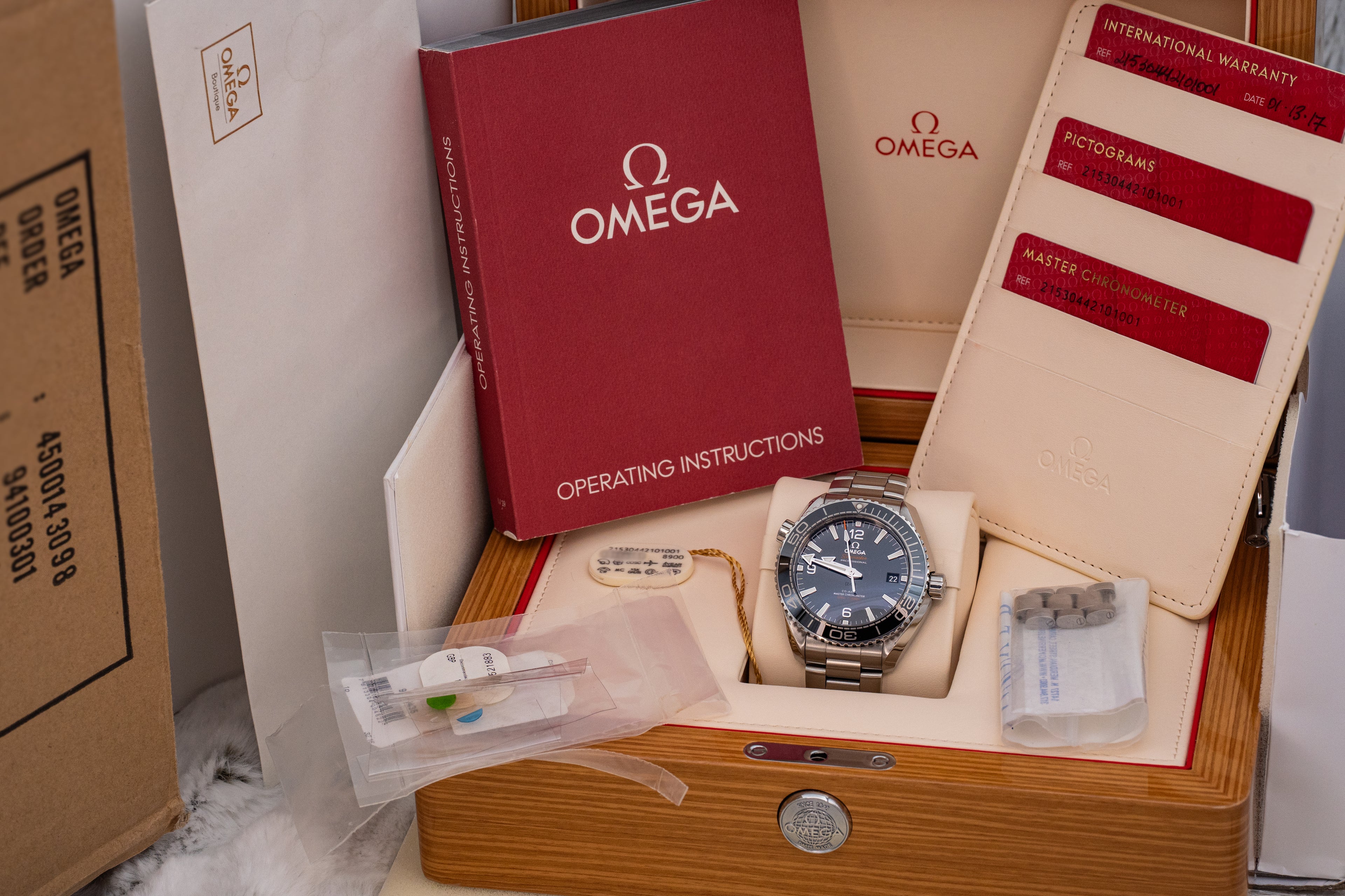 Omega Seamaster Planet Ocean 215.30.44.21.01.001 Black Dial B+P